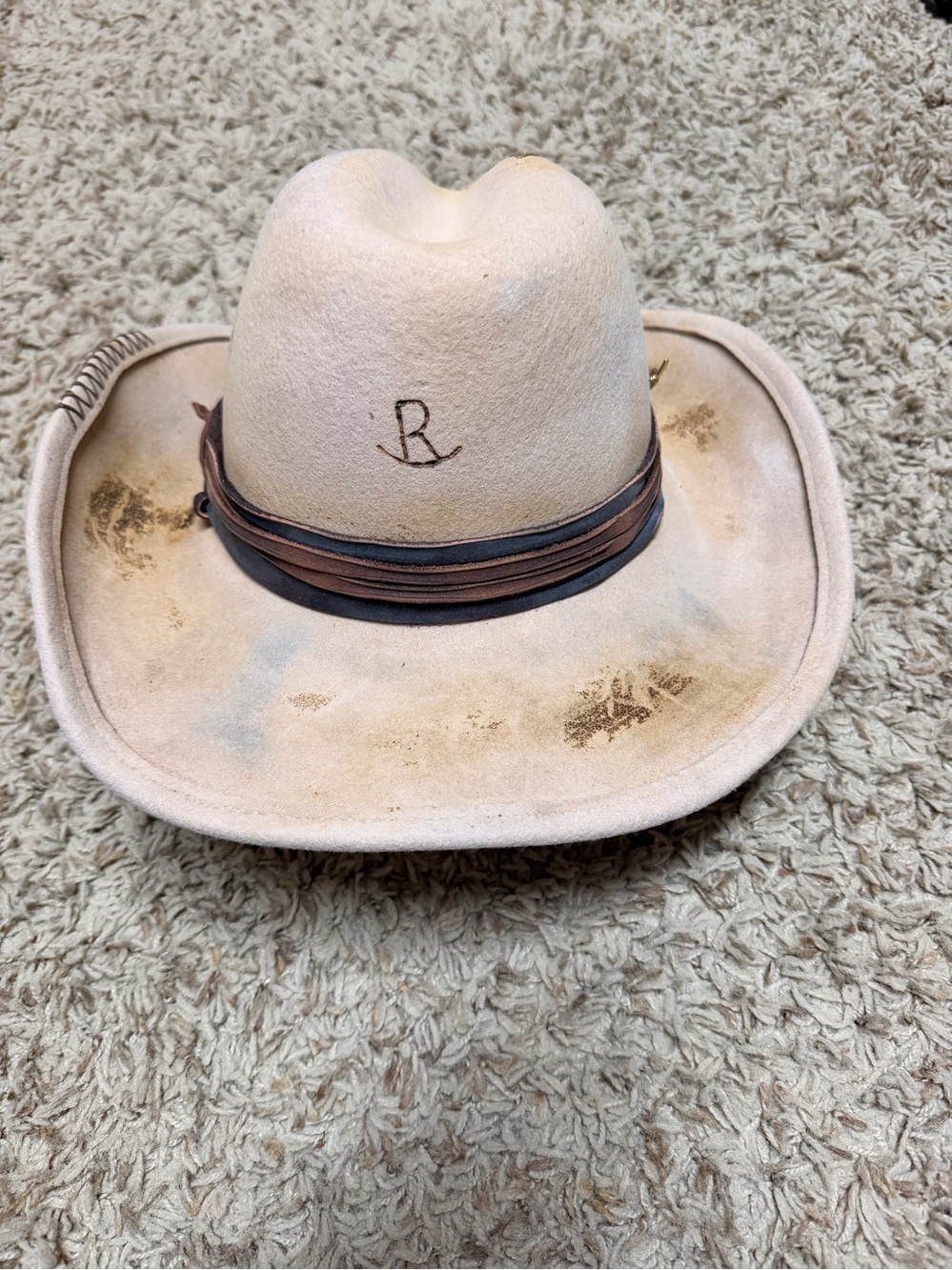A Rare Bird “Ranchers Daughter” hat. Distressed with leather band. 
One size